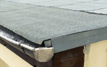 repair or replace Rockstowes flat roofing?